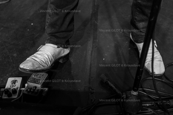 Jim Jones in white shoes